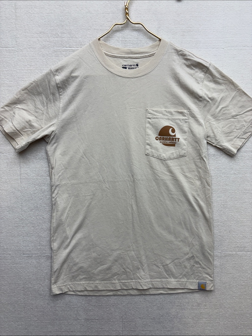Carhartt | small relaxed Short-Sleeve Pocket Tee in Light Tan with Brown Logo
